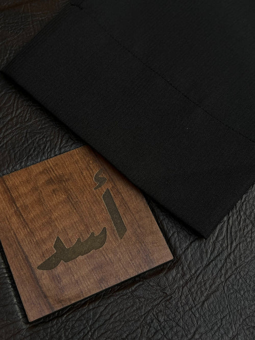 جديد أسد | ثوب الأسود المقلم