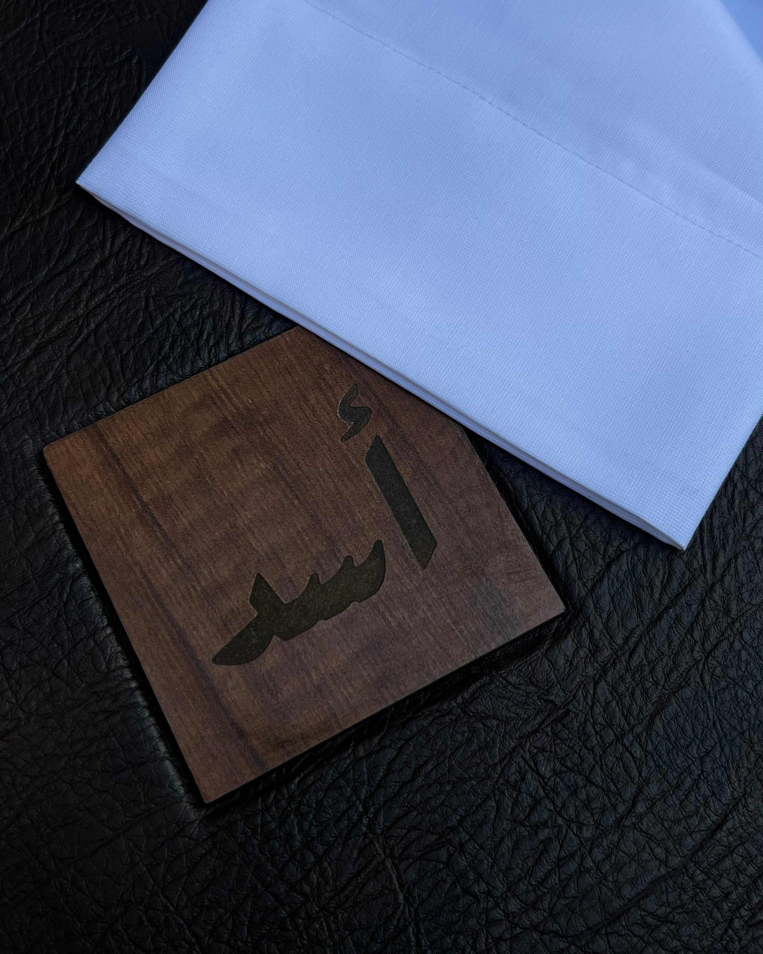 جديد أسد | ثوب الأبيض المقلم